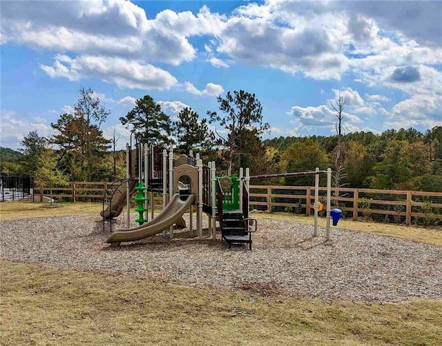 community play area featuring fence