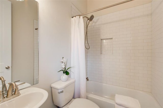 1240 Oakland Ter SW Unit B, Atlanta, GA 30310 - bathroom featuring shower / bath combo with shower curtain, a sink, and toilet