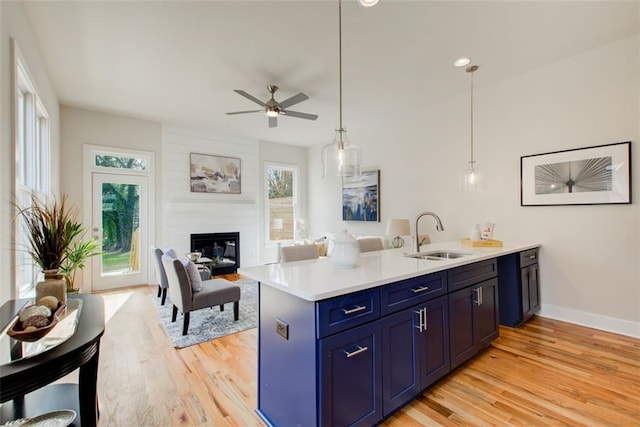 1240 Oakland Ter SW Unit B, Atlanta, GA 30310 - kitchen with a healthy amount of sunlight, a peninsula, a sink, and a ceiling fan