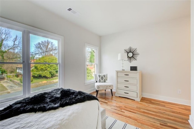 1240 Oakland Ter SW Unit B, Atlanta, GA 30310 - bedroom featuring baseboards, visible vents, and light wood finished floors