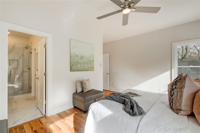 1240 Oakland Ter SW Unit B, Atlanta, GA 30310 - bedroom featuring a ceiling fan, ensuite bath, baseboards, and wood finished floors