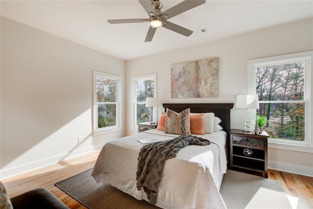 1240 Oakland Ter SW Unit B, Atlanta, GA 30310 - bedroom featuring visible vents, baseboards, ceiling fan, and wood finished floors