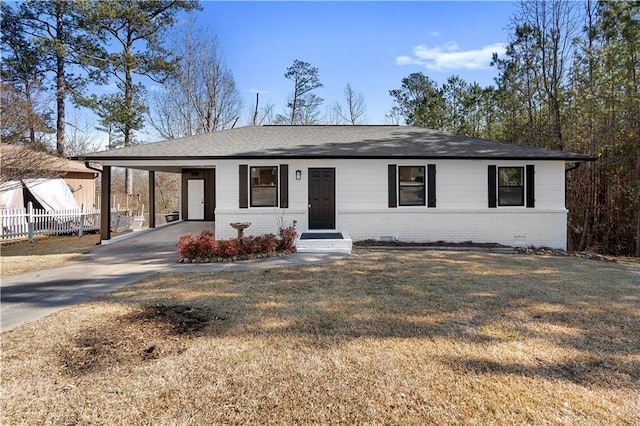 single story home with a front yard and a carport