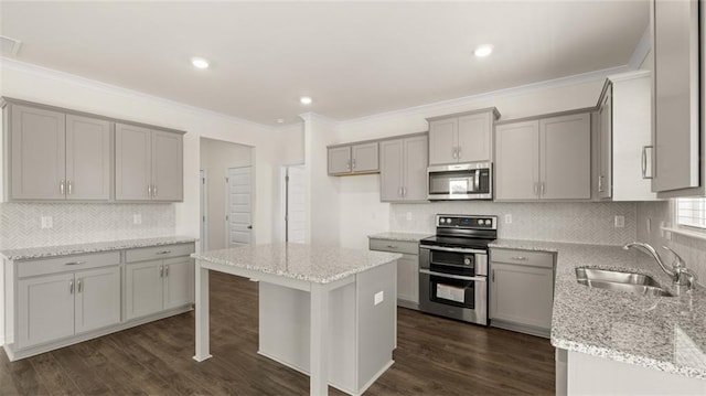 1141 Kingston Ave, Buckhead, GA 30625 - kitchen featuring appliances with stainless steel finishes, gray cabinets, ornamental molding, a sink, and recessed lighting