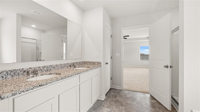 bathroom featuring vanity and ceiling fan