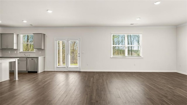 1141 Kingston Ave, Buckhead, GA 30625 - unfurnished living room featuring ornamental molding, dark wood-type flooring, baseboards, recessed lighting, and a sink