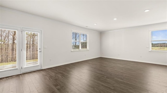 1141 Kingston Ave, Buckhead, GA 30625 - spare room featuring healthy amount of natural light, dark wood-type flooring, ornamental molding, baseboards, and recessed lighting