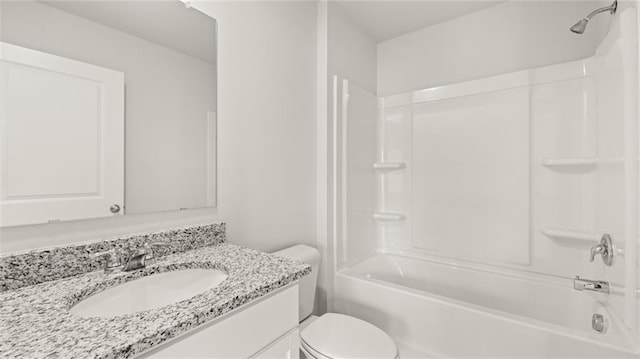 full bathroom with vanity, toilet, and shower / tub combination