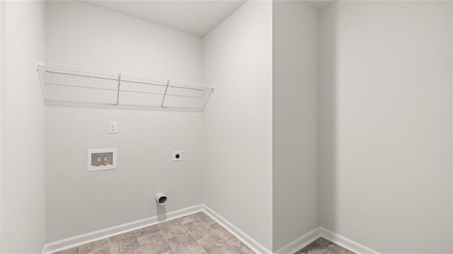 washroom with hookup for an electric dryer and washer hookup