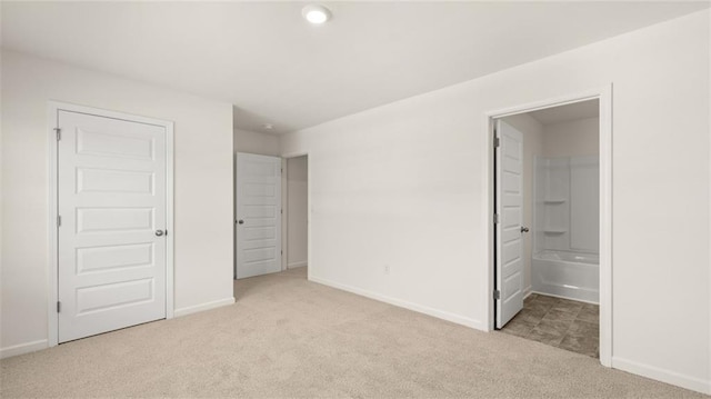 1141 Kingston Ave, Buckhead, GA 30625 - unfurnished bedroom with carpet flooring, baseboards, connected bathroom, and recessed lighting