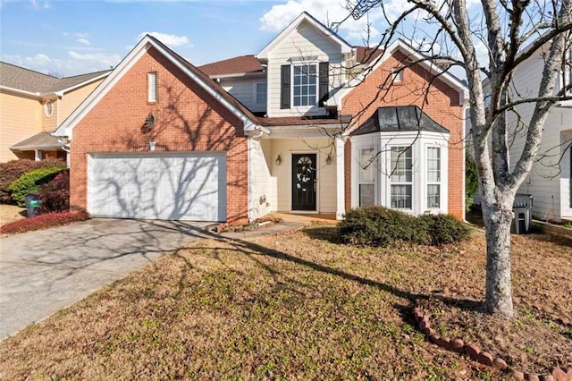 view of property featuring a front lawn