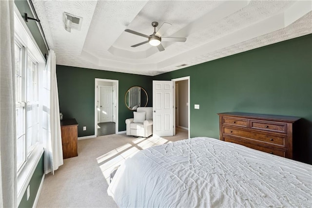 8450 Jot Em Down Rd, Gainesville, GA 30506 - bedroom with carpet, a ceiling fan, visible vents, baseboards, and a raised ceiling