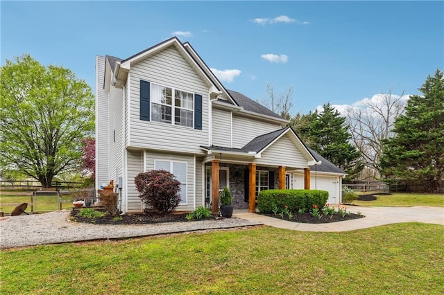 8450 Jot Em Down Rd, Gainesville, GA 30506 - traditional-style home with fence, a garage, concrete driveway, stone siding, and a front lawn