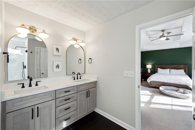 8450 Jot Em Down Rd, Gainesville, GA 30506 - ensuite bathroom with a ceiling fan, ensuite bathroom, double vanity, and a sink