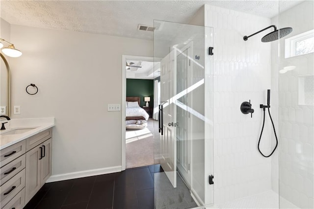 8450 Jot Em Down Rd, Gainesville, GA 30506 - bathroom with vanity, ensuite bath, visible vents, a walk in shower, and tile patterned flooring