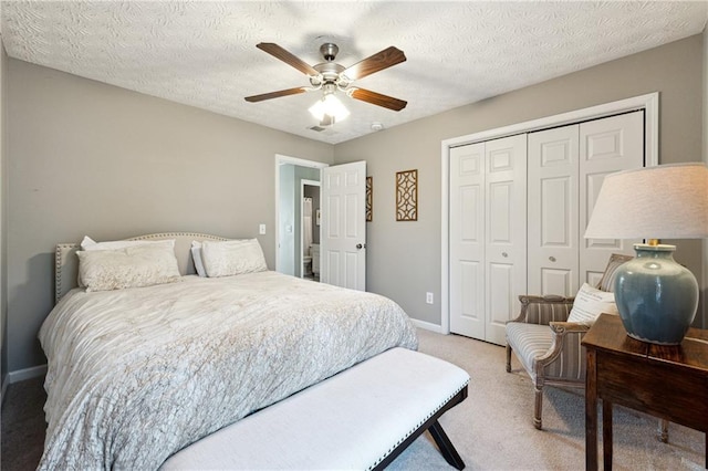 8450 Jot Em Down Rd, Gainesville, GA 30506 - bedroom with a closet, baseboards, ceiling fan, visible vents, and light carpet