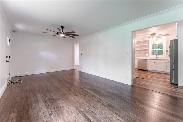 3620 W Lawrenceville St, Duluth, GA 30096 - unfurnished living room featuring a ceiling fan, wood finished floors, and crown molding