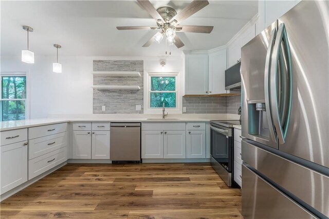 3620 W Lawrenceville St, Duluth, GA 30096 - kitchen with appliances with stainless steel finishes, healthy amount of natural light, and backsplash
