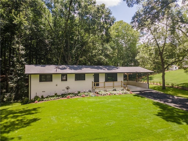 3620 W Lawrenceville St, Duluth, GA 30096 - view of front of home featuring a front yard, an attached carport, and driveway