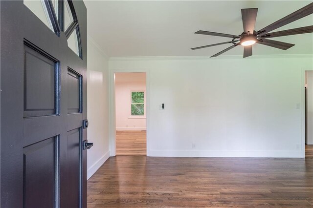 3620 W Lawrenceville St, Duluth, GA 30096 - empty room with ornamental molding, dark wood-type flooring, and a ceiling fan