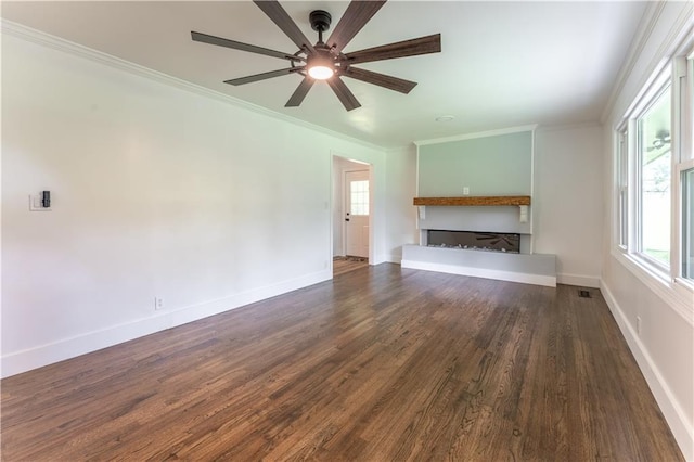 3620 W Lawrenceville St, Duluth, GA 30096 - unfurnished living room with crown molding, a fireplace, a ceiling fan, and dark wood finished floors