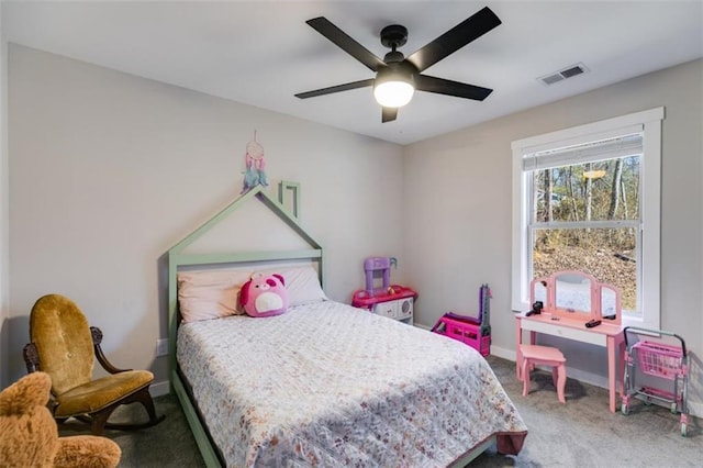 bedroom with ceiling fan and carpet