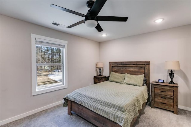 bedroom featuring ceiling fan and light colored carpet