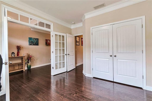 4708 Tiger Blvd, Duluth, GA 30096 - bedroom with french doors, crown molding, wood finished floors, baseboards, and a closet