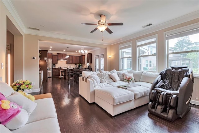 4708 Tiger Blvd, Duluth, GA 30096 - living area featuring a ceiling fan, dark wood-style flooring, ornamental molding, and a chandelier