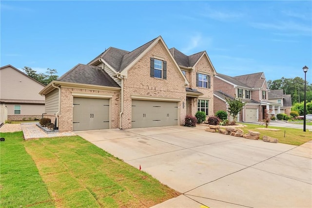 4708 Tiger Blvd, Duluth, GA 30096 - view of front of property with brick siding, driveway, a front yard, an attached garage, and roof with shingles