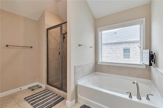 4708 Tiger Blvd, Duluth, GA 30096 - bathroom with a garden tub, a shower stall, tile patterned flooring, and baseboards