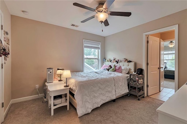 4708 Tiger Blvd, Duluth, GA 30096 - bedroom featuring light colored carpet, ceiling fan, and baseboards