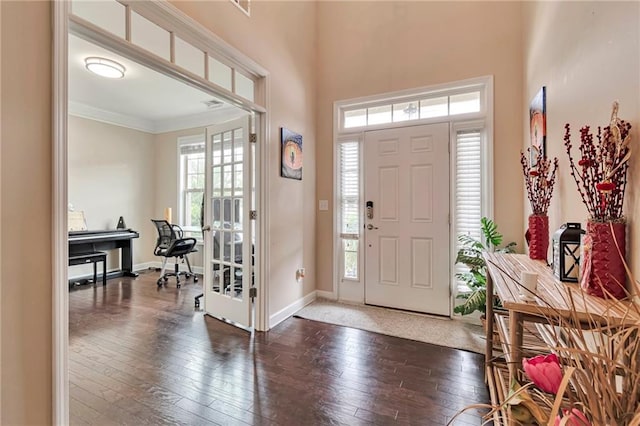 4708 Tiger Blvd, Duluth, GA 30096 - foyer entrance with wood-type flooring, baseboards, crown molding, and a towering ceiling