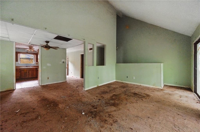 1352 Overlook Cv SE, Smyrna, GA 30080 - unfurnished living room featuring a ceiling fan and vaulted ceiling