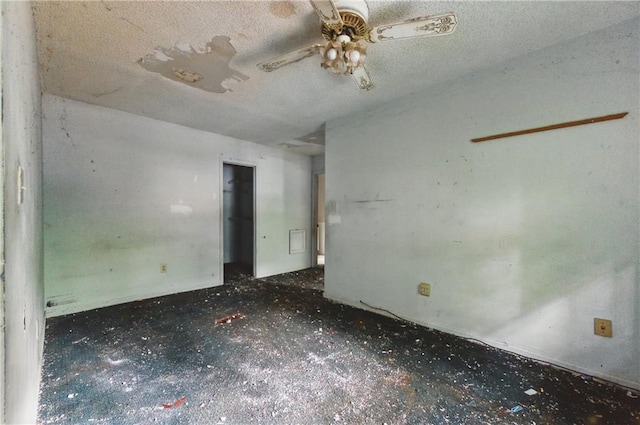 1352 Overlook Cv SE, Smyrna, GA 30080 - unfurnished room with a ceiling fan and a textured ceiling