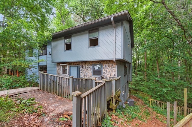 1352 Overlook Cv SE, Smyrna, GA 30080 - back of house featuring a deck and stone siding