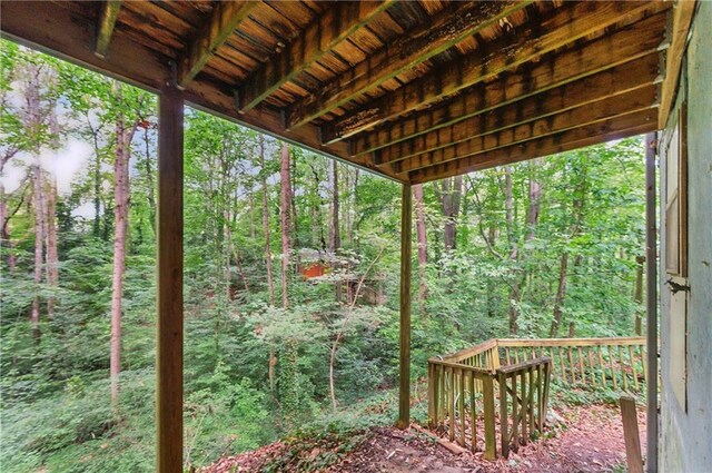 1352 Overlook Cv SE, Smyrna, GA 30080 - deck featuring a wooded view