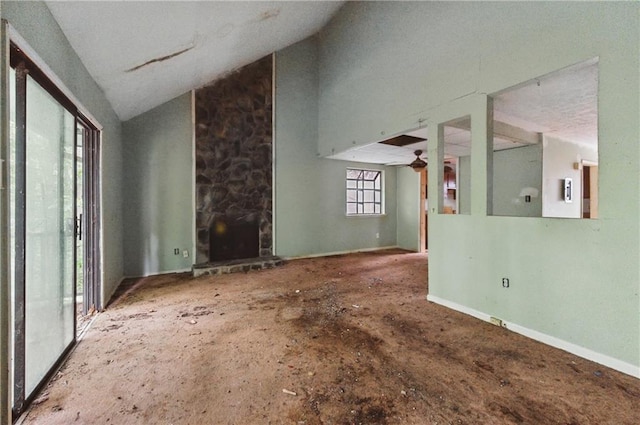 1352 Overlook Cv SE, Smyrna, GA 30080 - unfurnished living room featuring a fireplace and high vaulted ceiling