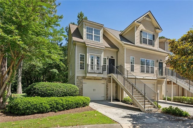 3150 Stonewyck Pl, Decatur, GA 30033 - view of front of house featuring an attached garage, stairs, driveway, and a porch