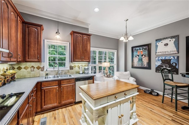 3150 Stonewyck Pl, Decatur, GA 30033 - kitchen featuring stainless steel dishwasher, a sink, plenty of natural light, black electric stovetop, and ornamental molding