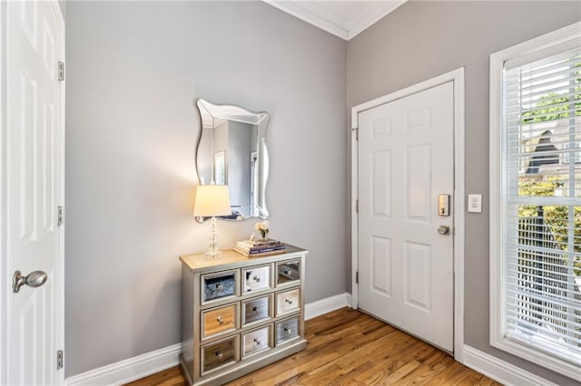 3150 Stonewyck Pl, Decatur, GA 30033 - entrance foyer featuring crown molding, baseboards, healthy amount of natural light, and light wood-style floors