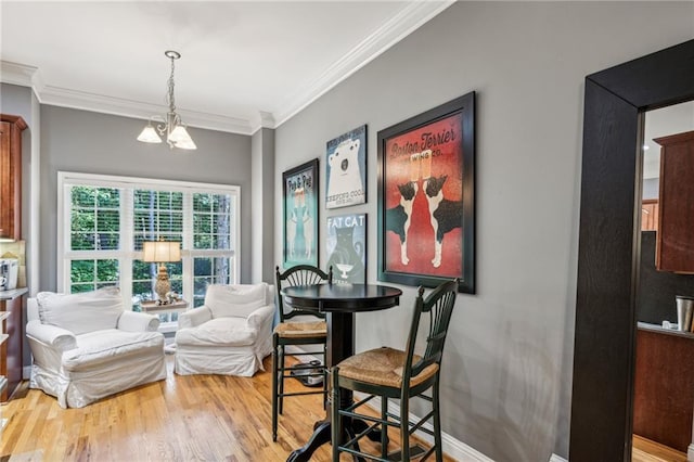 3150 Stonewyck Pl, Decatur, GA 30033 - dining area featuring crown molding, a chandelier, wood finished floors, and baseboards