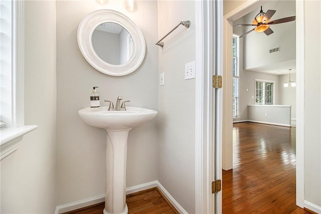 3710 Ridgefair Dr, Cumming, GA 30040 - bathroom featuring wood-type flooring and a ceiling fan