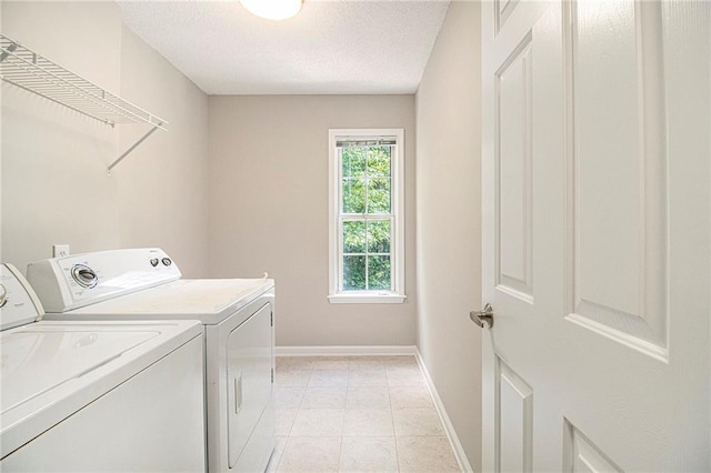 3710 Ridgefair Dr, Cumming, GA 30040 - laundry room with washing machine and dryer and a textured ceiling