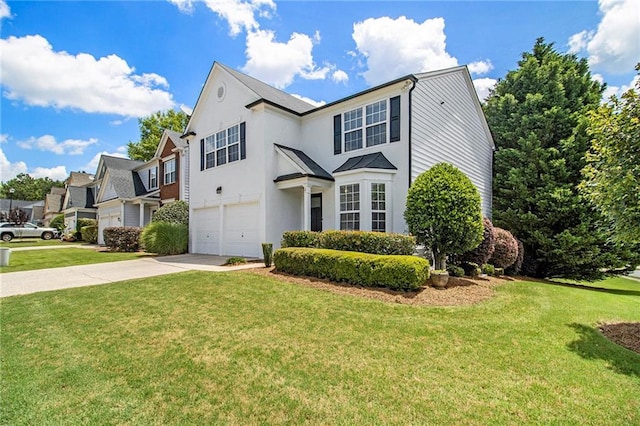 3710 Ridgefair Dr, Cumming, GA 30040 - view of front of house featuring an attached garage, driveway, stucco siding, and a front lawn