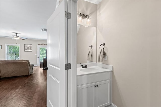 3875 Valley View Ct, Gainesville, GA 30501 - bathroom featuring wood finished floors, ceiling fan, vanity, and baseboards