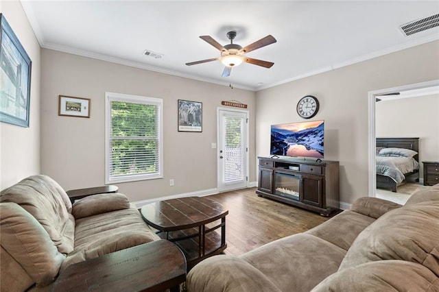 3875 Valley View Ct, Gainesville, GA 30501 - living room featuring ceiling fan, crown molding, wood finished floors, and baseboards