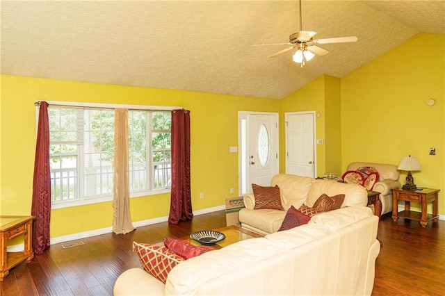 68 Paradise Pointe, Douglasville, GA 30134 - living room with ceiling fan, wood finished floors, vaulted ceiling, baseboards, and a textured ceiling