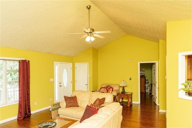68 Paradise Pointe, Douglasville, GA 30134 - living area featuring wood finished floors, vaulted ceiling, a ceiling fan, a textured ceiling, and baseboards