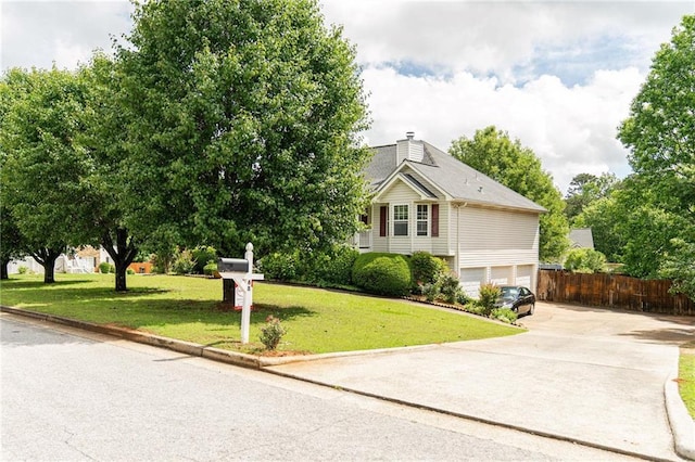 68 Paradise Pointe, Douglasville, GA 30134 - view of front of property featuring driveway, a garage, and a chimney